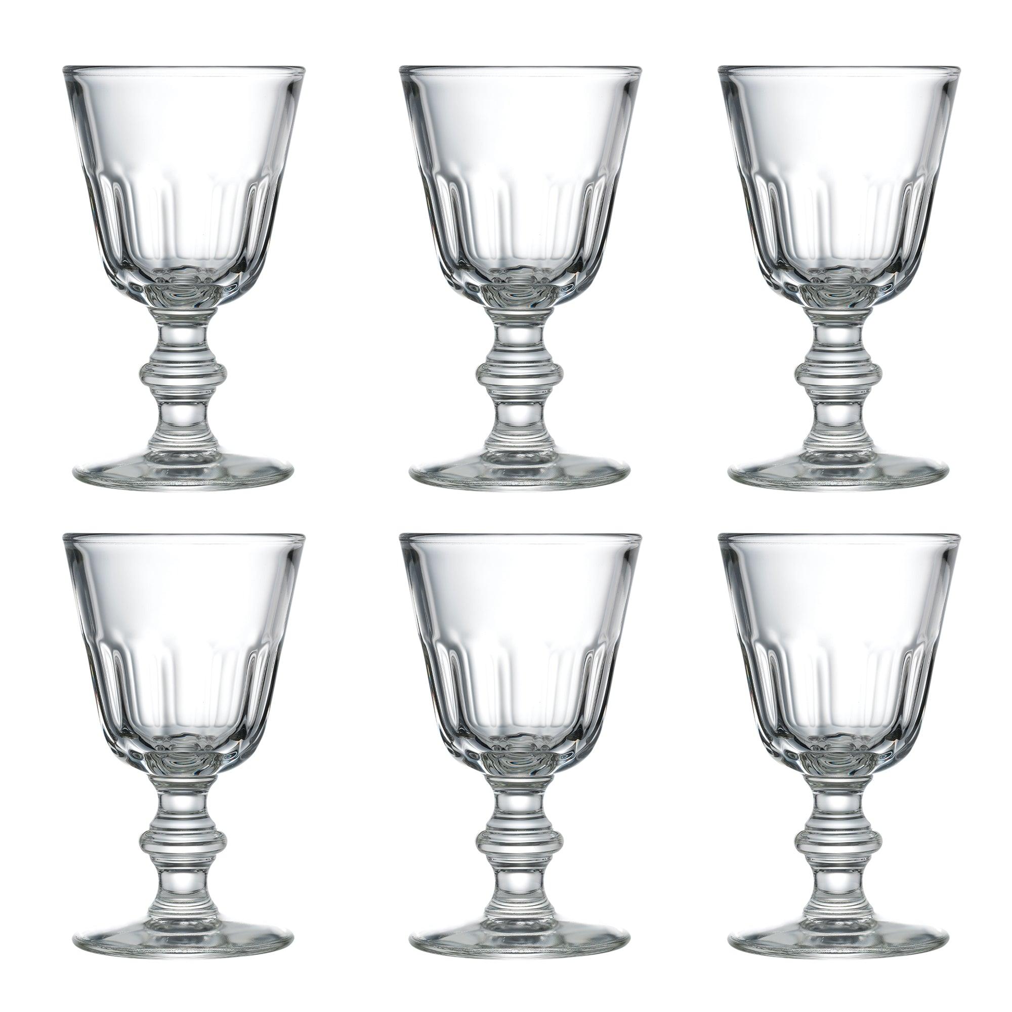 6 vinglas fra La Rochere's Perigord-serie. Glassene har en solid stamme med rillede detaljer, der giver dem et klassisk og elegant udseende. De er arrangeret i to rækker med tre glas i hver række på en hvid baggrund.